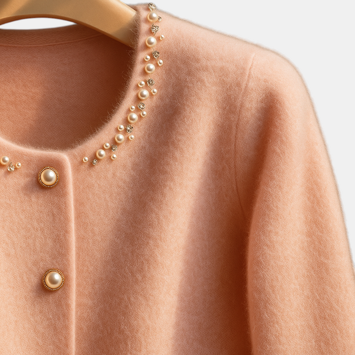 Margaret Dublin pink cardigan with hand-applied pearls at the neckline and elegant gold buttons.