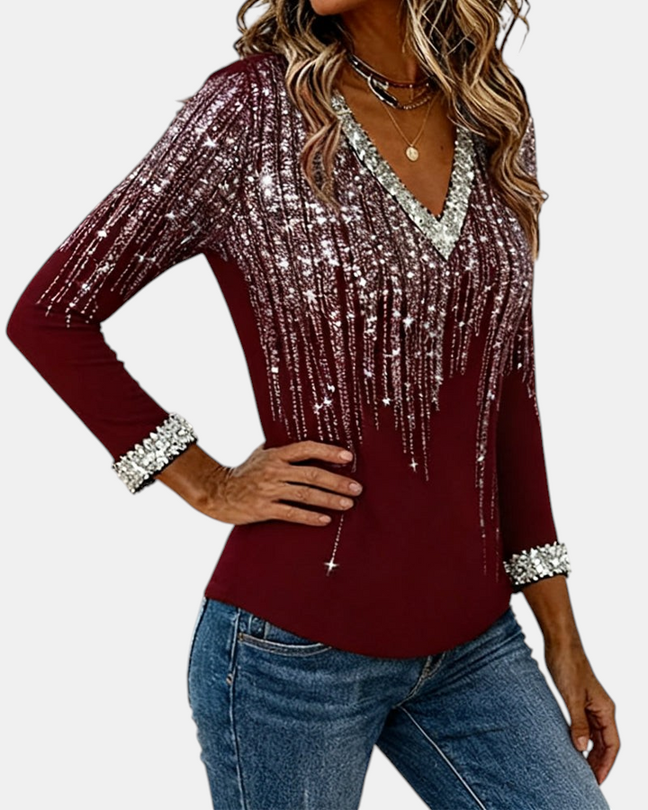 Margaret Dublin women's burgundy top with V-neck, sparkly details and embellished cuffs, smart-casual style.