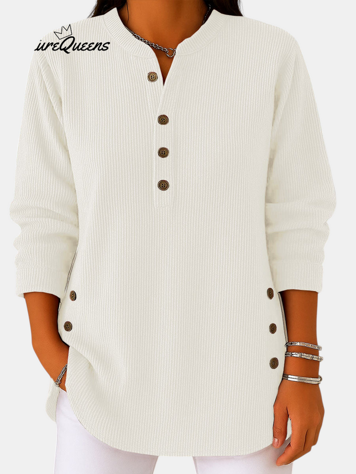 Margaret Dublin white tunic with buttoned neckline, long sleeves and side button details, casual style.