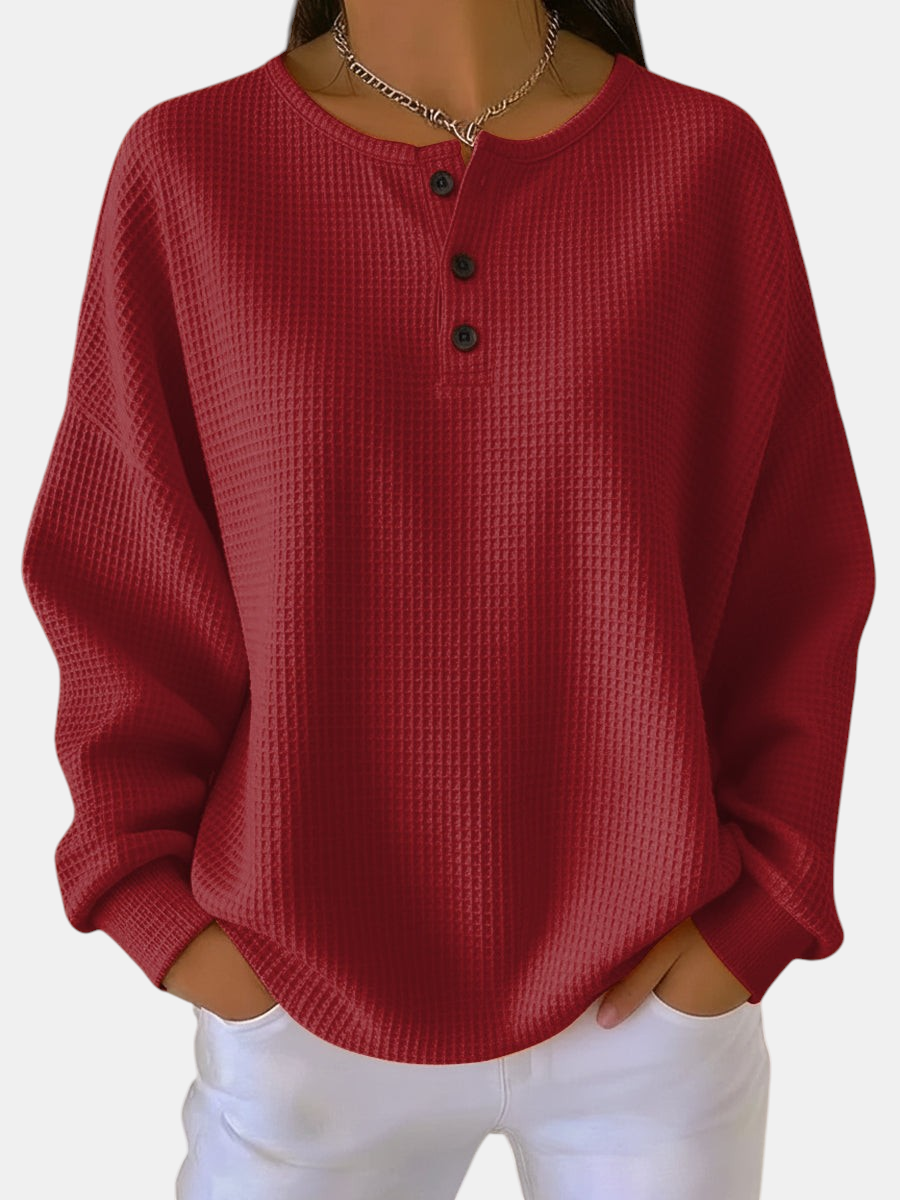 Margaret Dublin Hélène red waffle-knit jumper with buttons, loose and feminine fit.