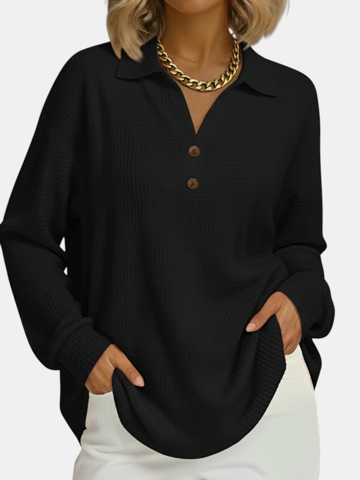 Margaret Dublin black sweatshirt with polo collar, front buttons and ribbed texture, ideal for a smart-casual look.