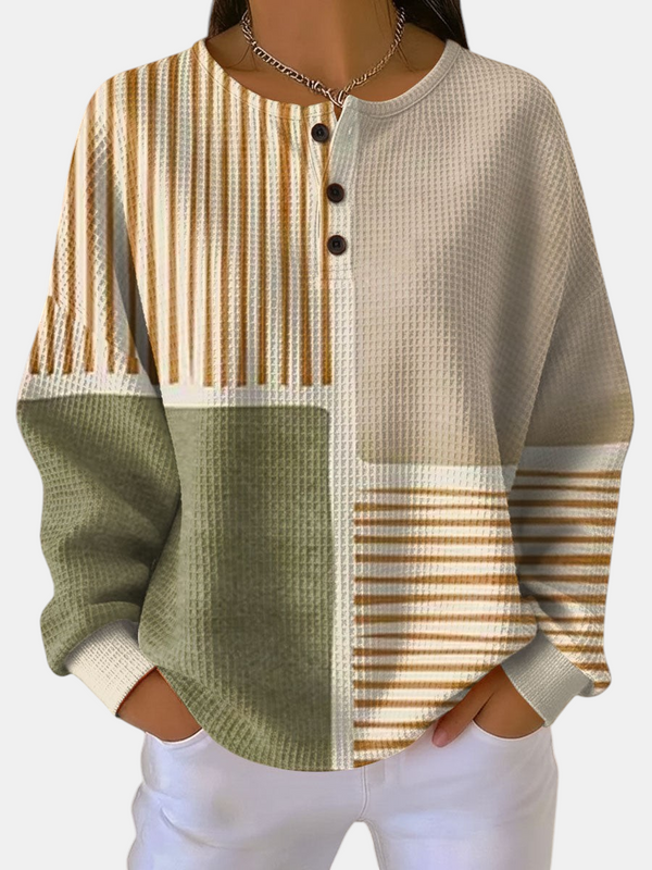 Margaret Dublin women's sweatshirt with geometric pattern in beige, green and stripe tones, textured fabric and buttons.