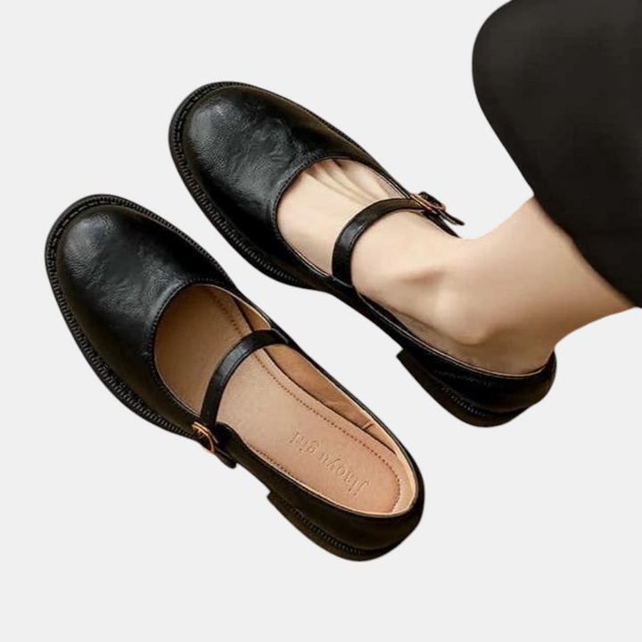 Sapatos Mary Jane pretos da Margaret Dublin com tira fina e fivela, design clássico e elegante para mulher.