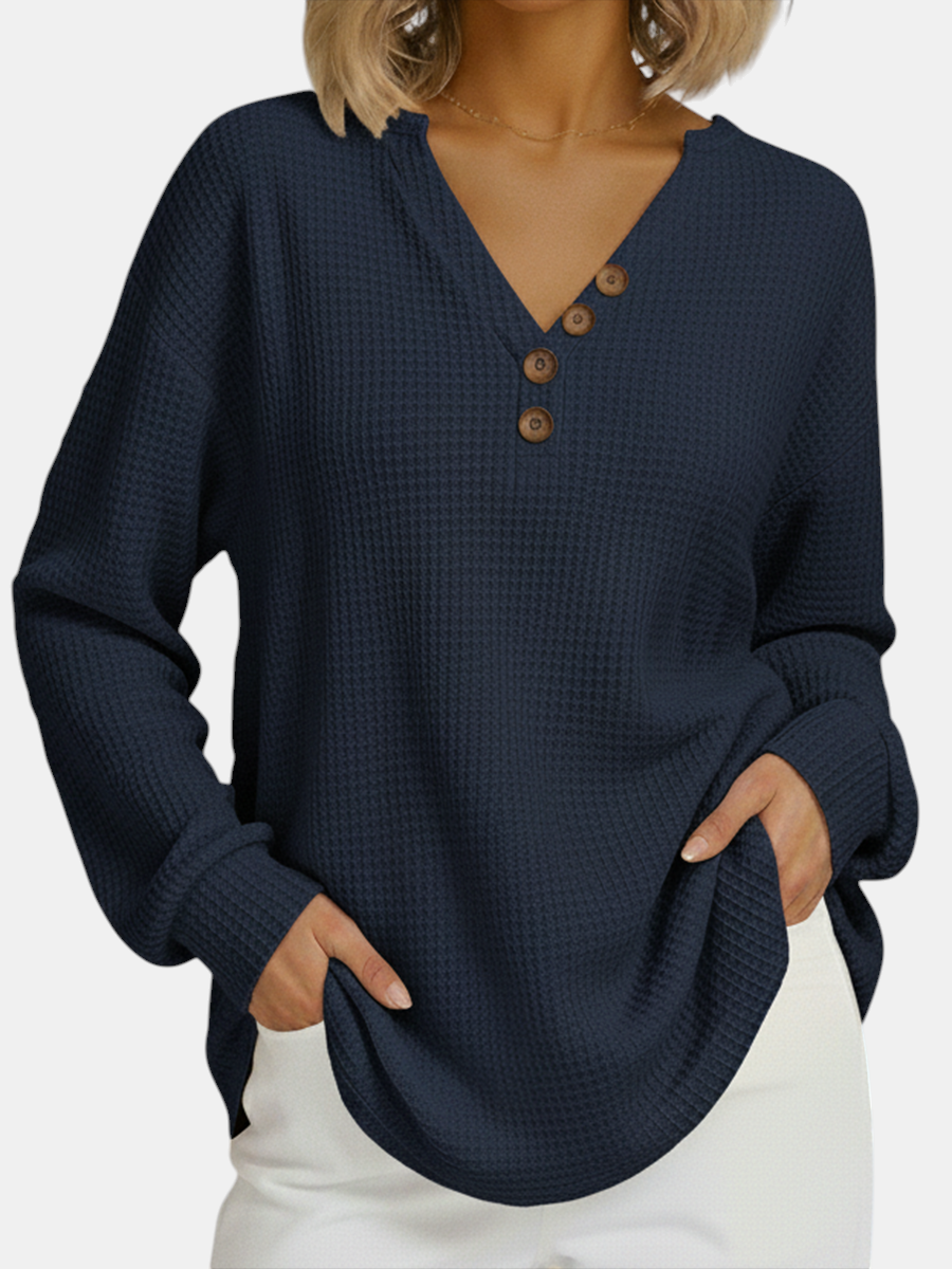 Margaret Dublin women's navy sweatshirt with waffle texture, buttoned V-neck and elegant loose cut.