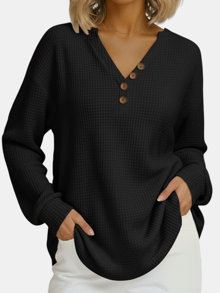 Margaret Dublin black waffle-knit sweatshirt with V-neck and buttons, comfortable casual style.