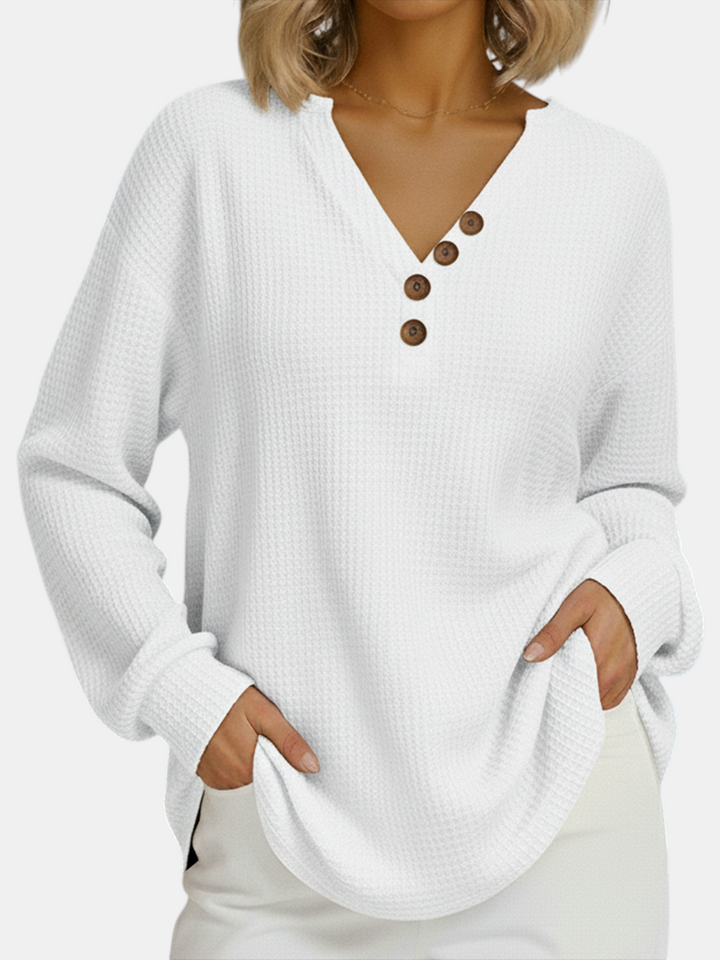 Margaret Dublin white sweatshirt with waffle texture, buttoned V-neck and comfortable feminine cut.