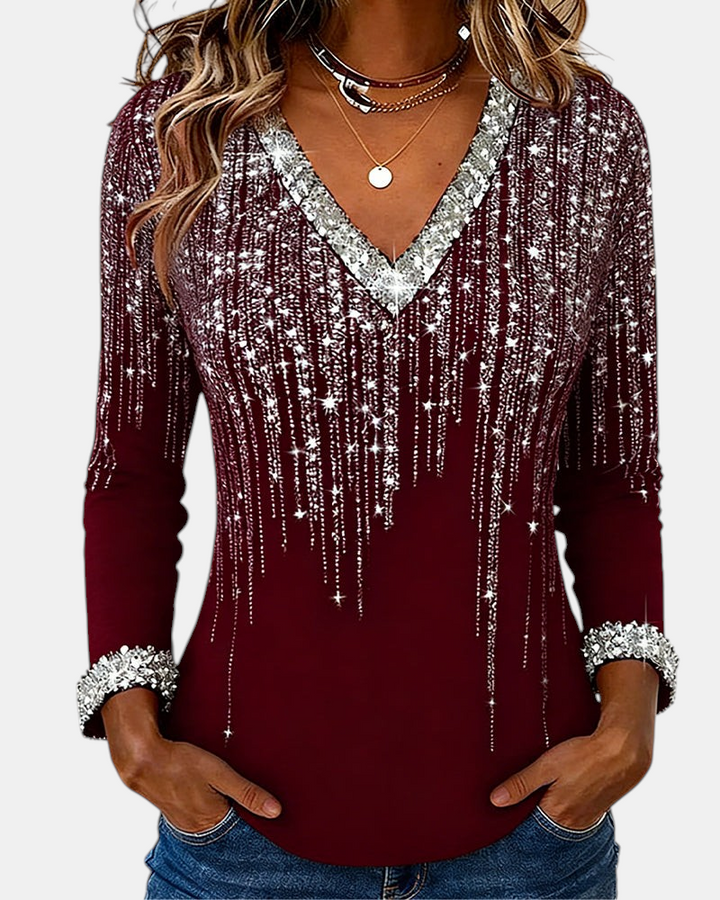 Margaret Dublin burgundy blouse with V-neck, sparkly silver details and long sleeves, smart-casual style.