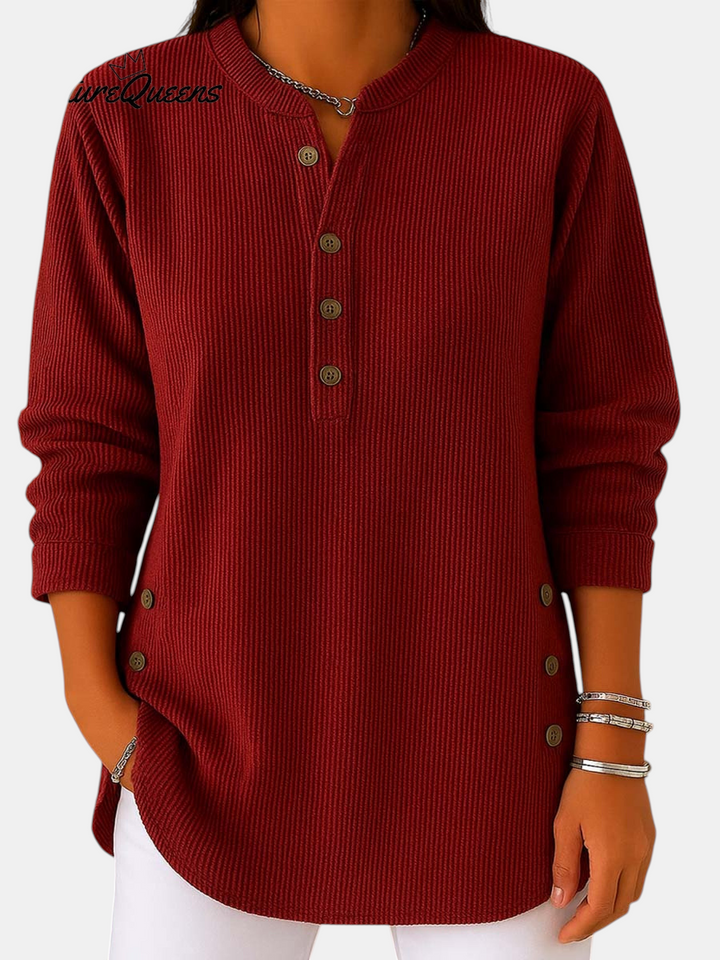 Margaret Dublin red tunic with buttons, elegant neckline and textured fabric, ideal for a casual look.