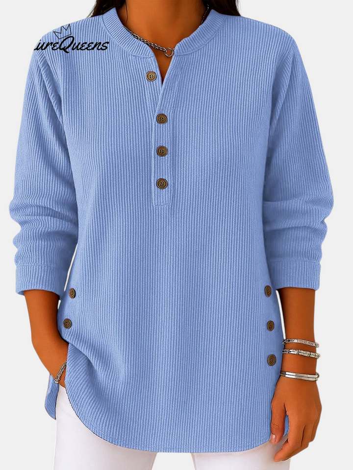 Margaret Dublin light blue tunic with ribbed texture, buttoned neckline and side details, smart-casual style.