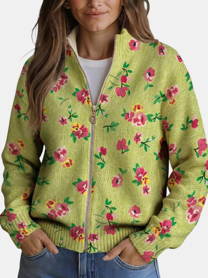 Cardigã de malha Margaret Dublin verde-claro com estampado floral rosa e vermelho, fecho frontal e gola subida.