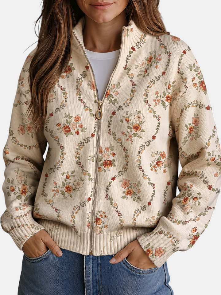 Cardigan de malha Margaret Dublin em creme com estampado floral, gola alta, fecho frontal e punhos canelados.