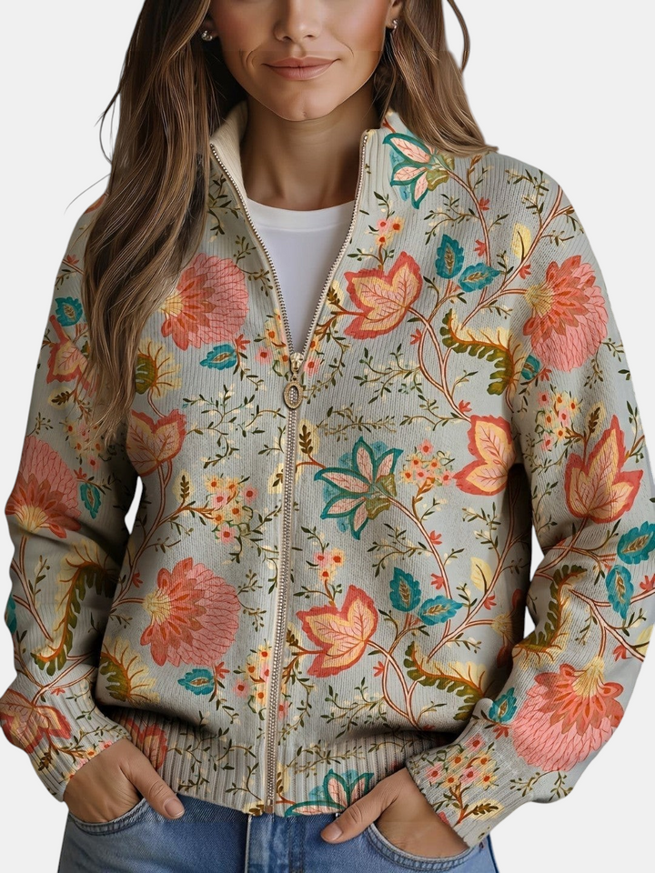 Cardigã de malha Margaret Dublin com padrão floral de jardim em tons de coral, verde e azul-petróleo com fecho dourado